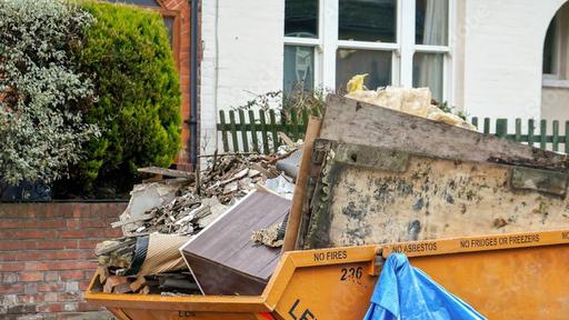 Domestic skip filled with debris